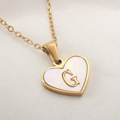 A personalized heart-shaped necklace with a 26-letter charm, crafted from high-quality stainless steel and gold plating.