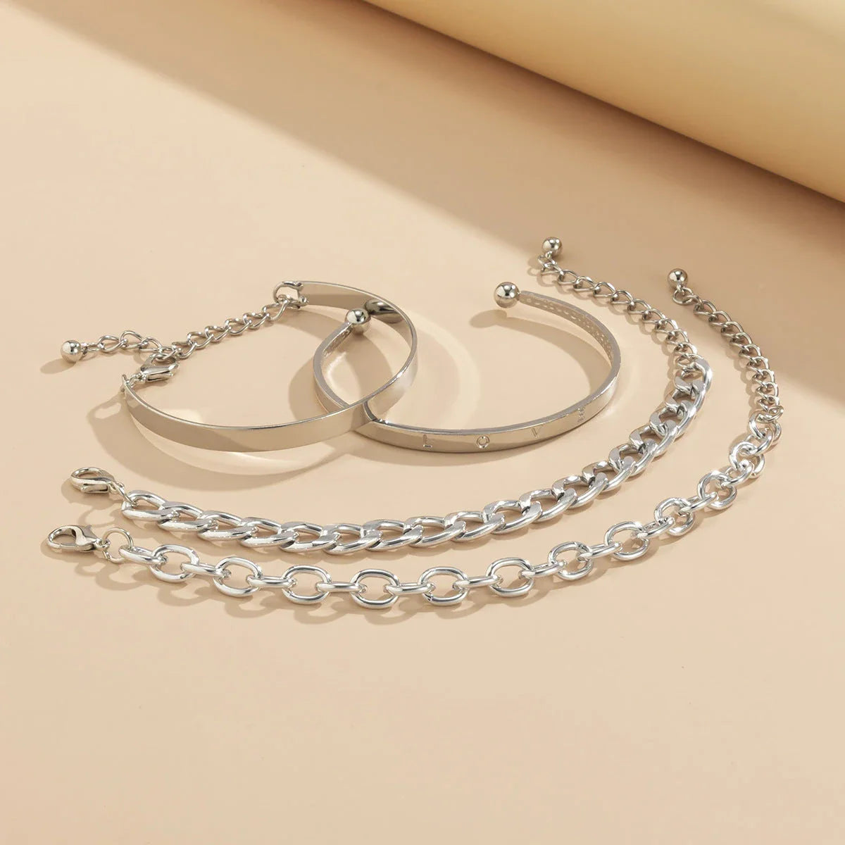 C-Shaped Hollow Chain Bracelet Set in gold and silver colors, showcasing a modern and elegant design