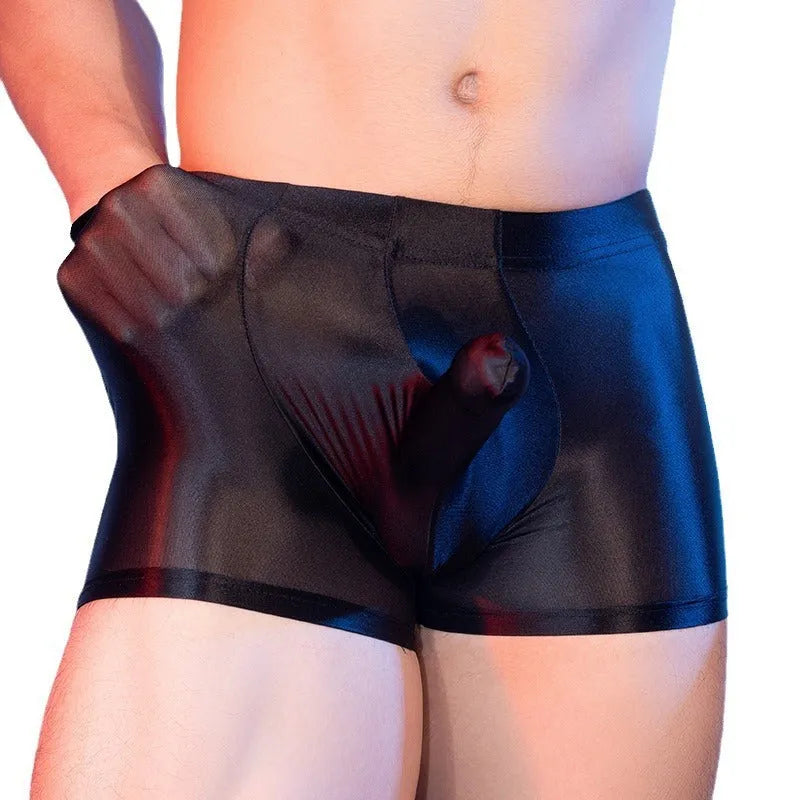 Men's thin nylon boxer shorts in red, showing seamless construction and mid-waist style.