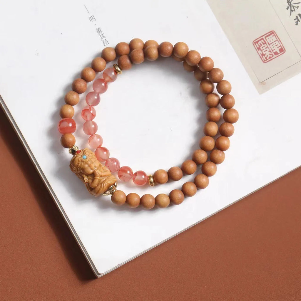 Brown sandalwood bracelet with 6mm round beads in double circle woven design