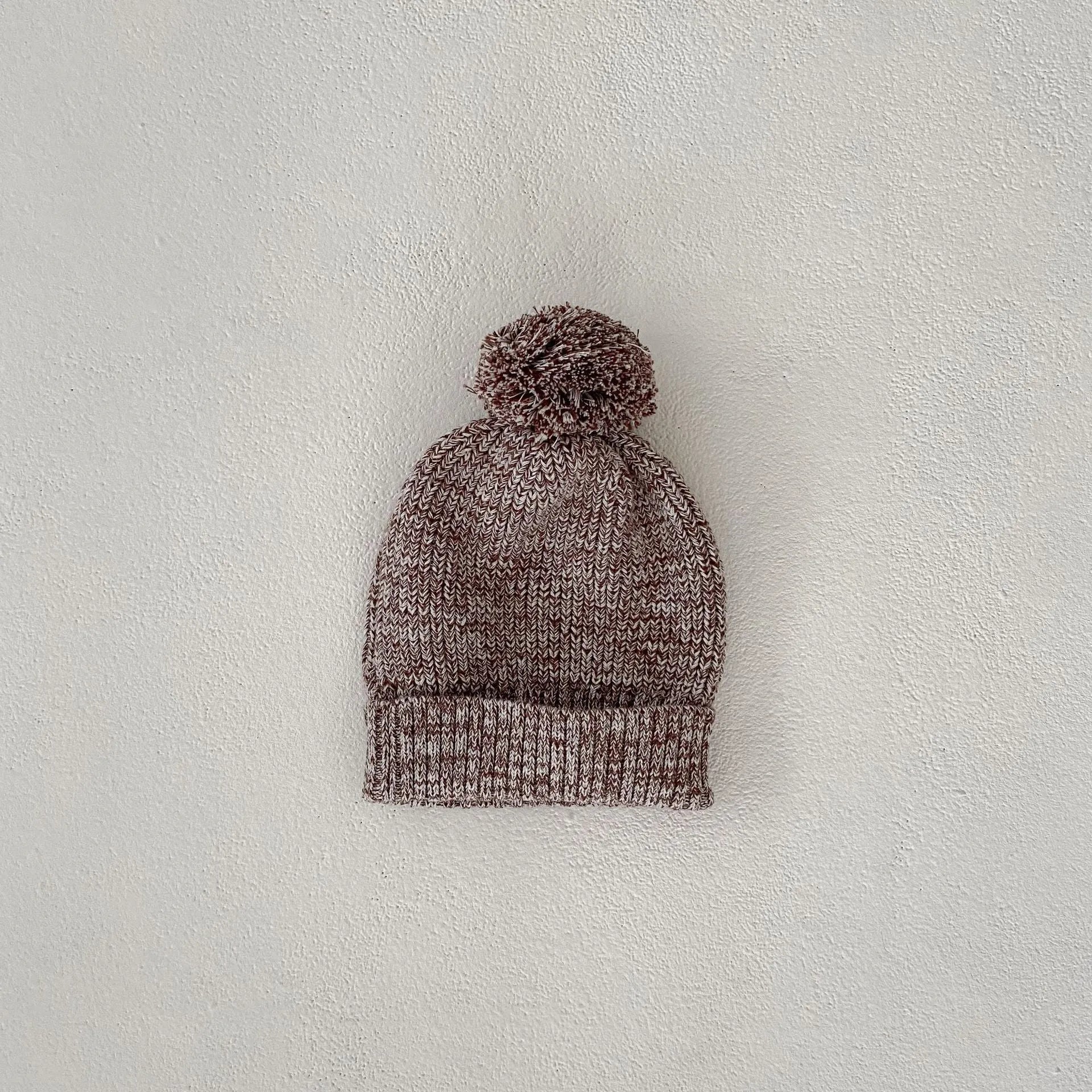 Dark brown cotton knitted three-piece set for infant girl with fur ball hat