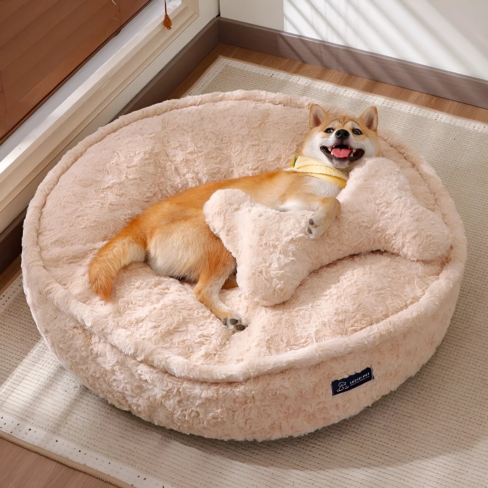 Milk tea coloured washable pet bed with round nest design shown in multiple sizes