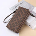 Long PU leather wallet clutch with zip closure and retro print decoration showing internal compartments