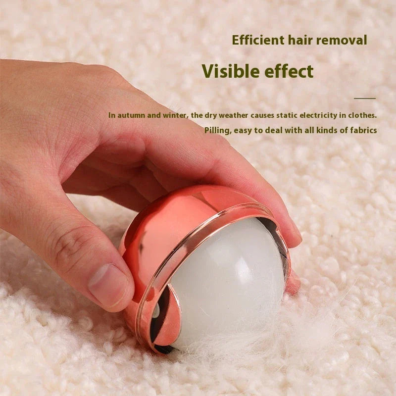 Reusable lint roller in liquid silver and rose gold colors for removing pet hair and lint from clothes, furniture, and other fabrics