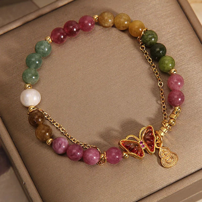Natural jade coloured agate bracelet for women with butterfly and gourd shaped beads.