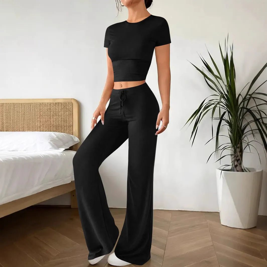 Black high waist trousers and matching short sleeve t-shirt set on hanger