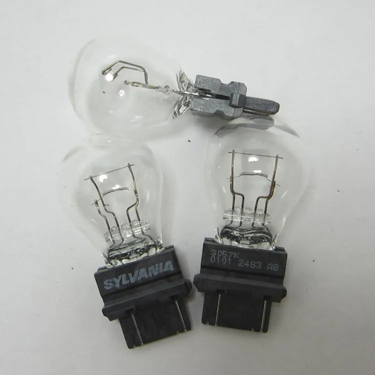 Wagner dual-wire brake light bulb with 16mm socket and yellow light