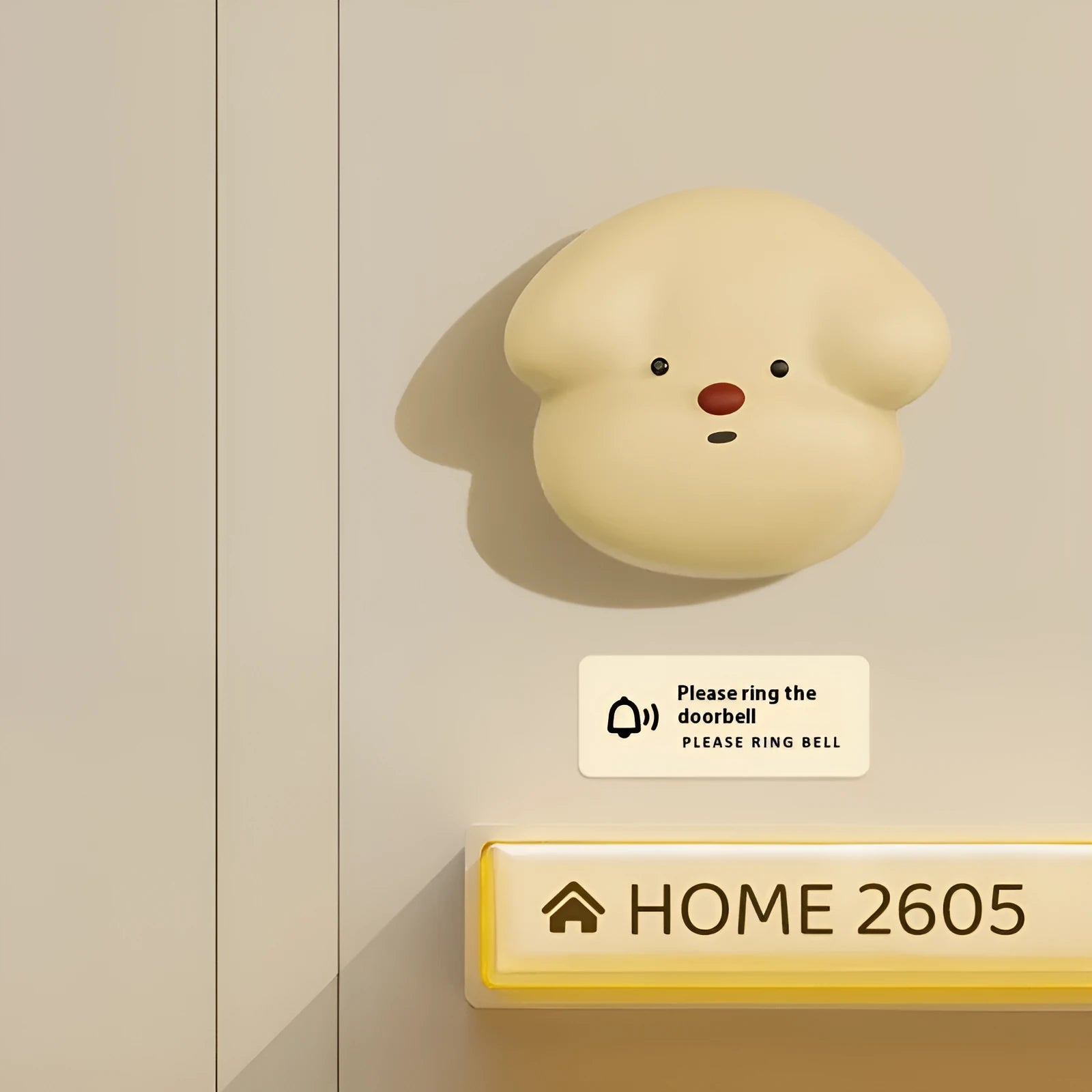 Household wireless doorbell unit with plug-in receiver in milky yellow or white colour.