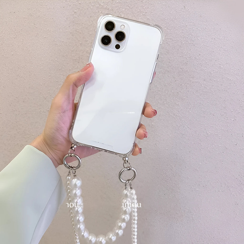 Soft iPhone case with large white pearl decoration and silver chain in Japanese Korean style.