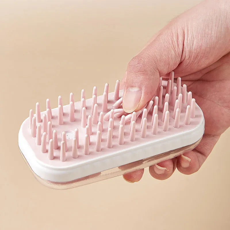 Silicone pet bath massage brush for dogs and cats with hand strap and suction cup attachment