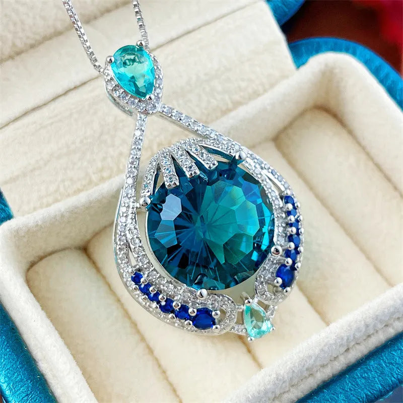Blue crystal geometric-cut fireworks pendant necklace on water wave chain for women