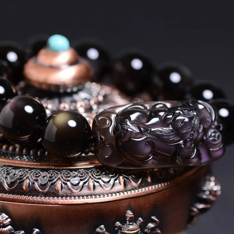 Polished crystal Pi Xiu bead bracelet showing geometric shape, available in multiple sizes and ice stone colours.
