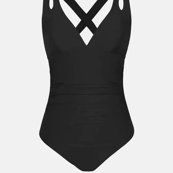 Solid colour one-piece swimsuit with a triangle bikini top and cross shoulder straps.