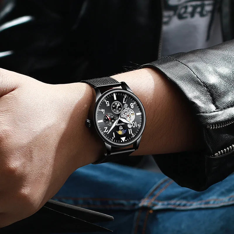 Men's black mechanical watch with moon phase complication and luminous hands on alloy case