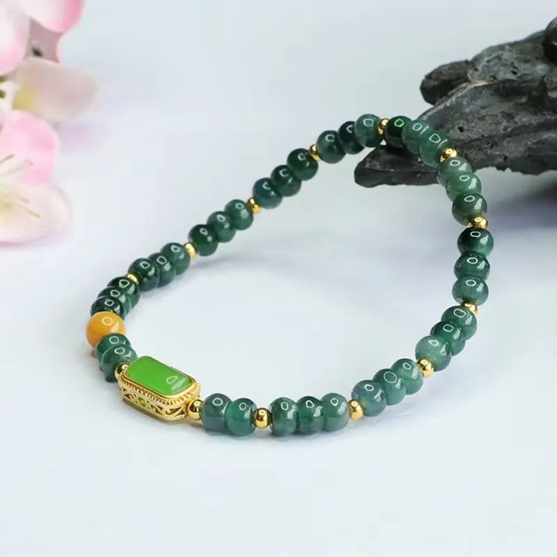 Natural stone blue water jade and jasper bracelet with topaz accents and electroplated metal components