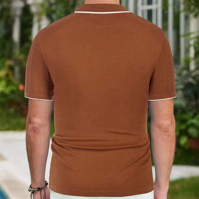 Short-sleeve polo shirt in brown, navy blue, and khaki colors with unique flocked design and regular fit