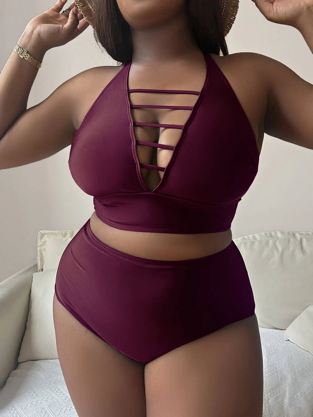 Plus size hollow cross halter bikini in black with adjustable straps and high waist briefs
