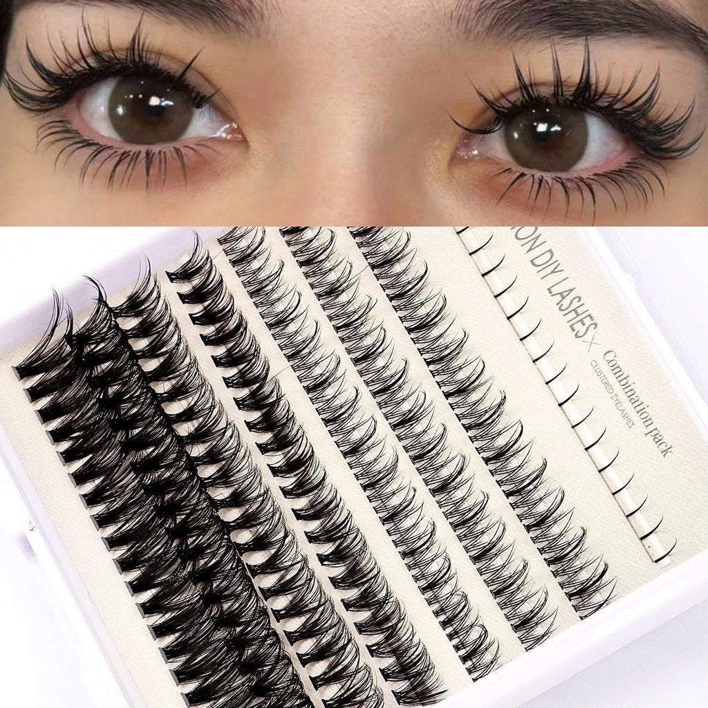 False eyelash kit with natural segmented clusters, adhesive tubes, tweezers and brushes on pink background