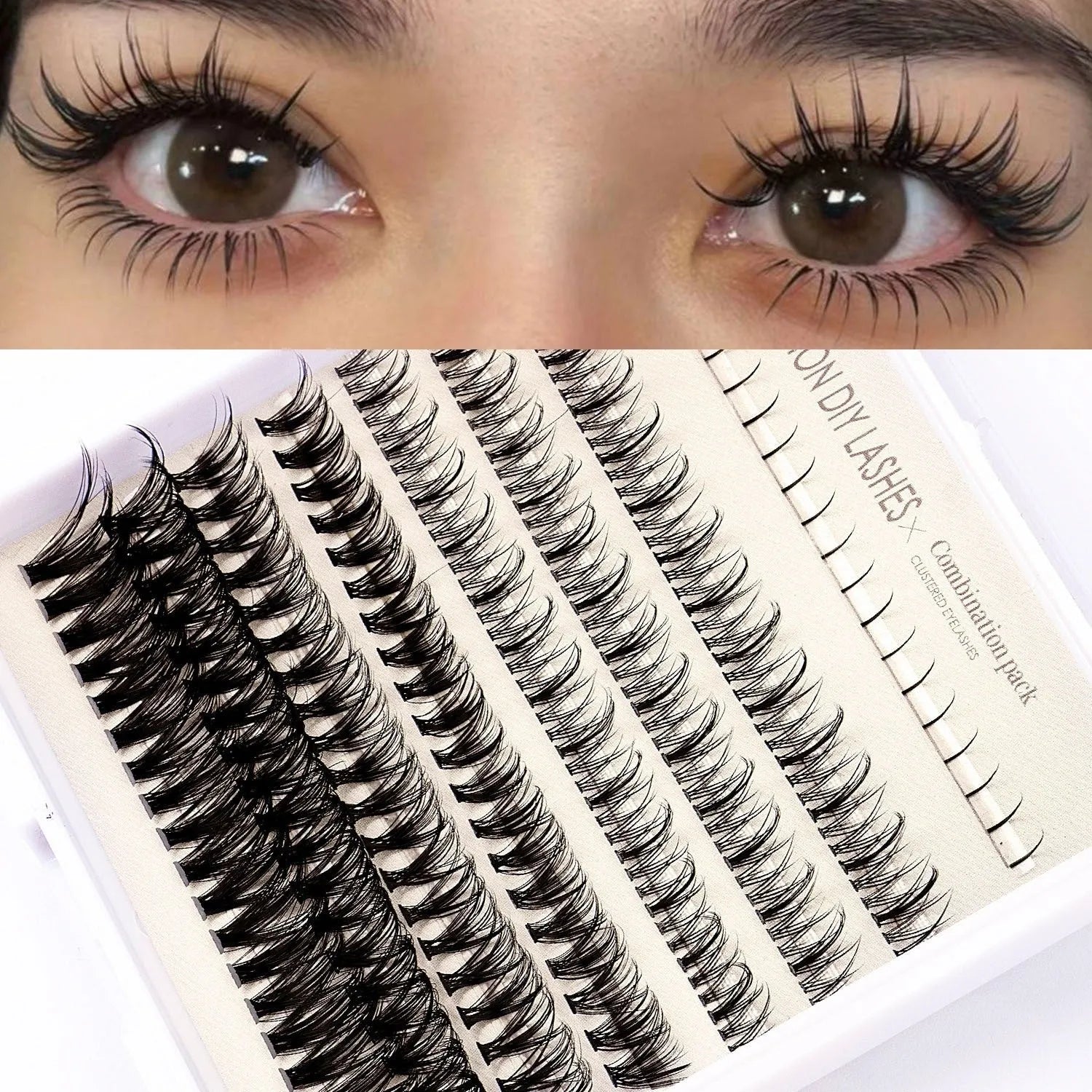 False eyelash kit with natural segmented clusters, adhesive tubes, tweezers and brushes on pink background