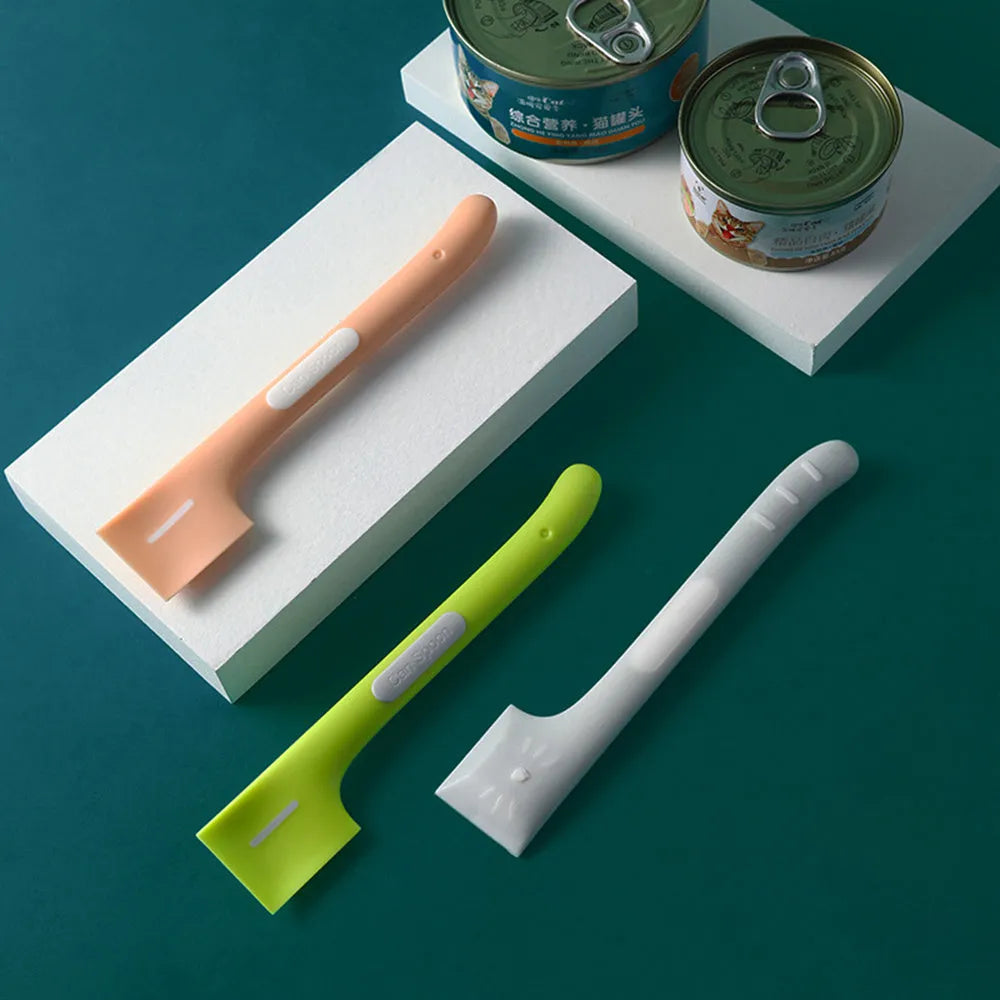 Green TPR pet feeding spoon with long handle and angled scoop for canned food