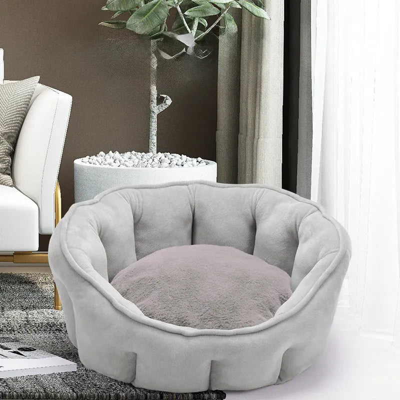 Grey plush cat kennel mat showing enclosed design with raised sides and soft interior.