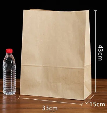 Yellow kraft paper tin foil bag with aluminum foil interior for snack food packaging