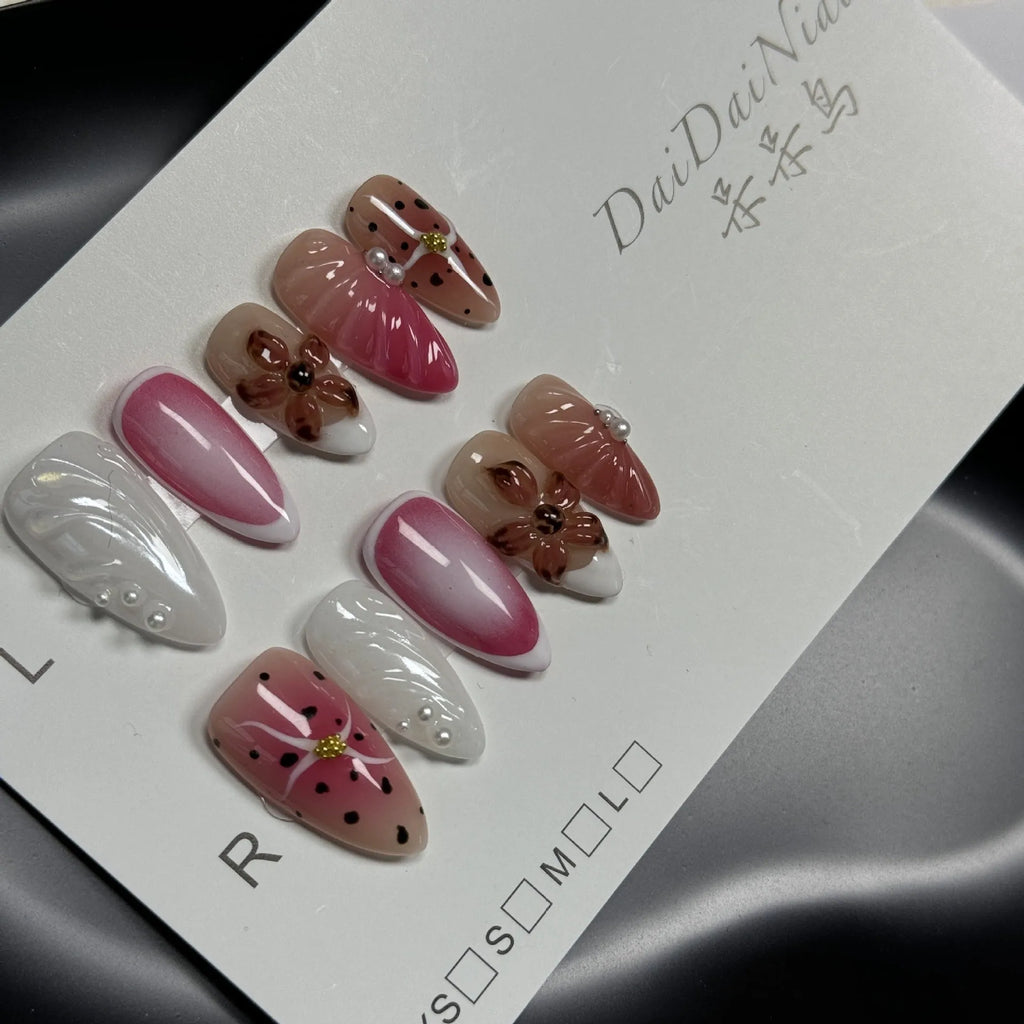 Hand-painted 3D nail art stickers with carved candy patterns in almond shapes
