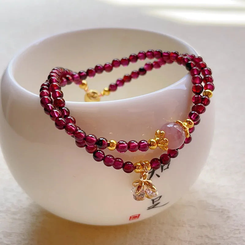 Women's natural garnet bracelet with double ring design in H311 colour, handcrafted using manual processing techniques