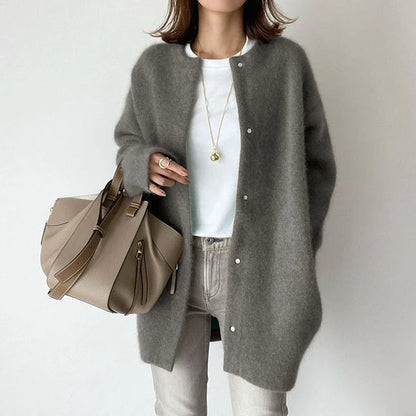 A cozy, stylish knitted cardigan jacket in a variety of colors for women's autumn and winter fashion