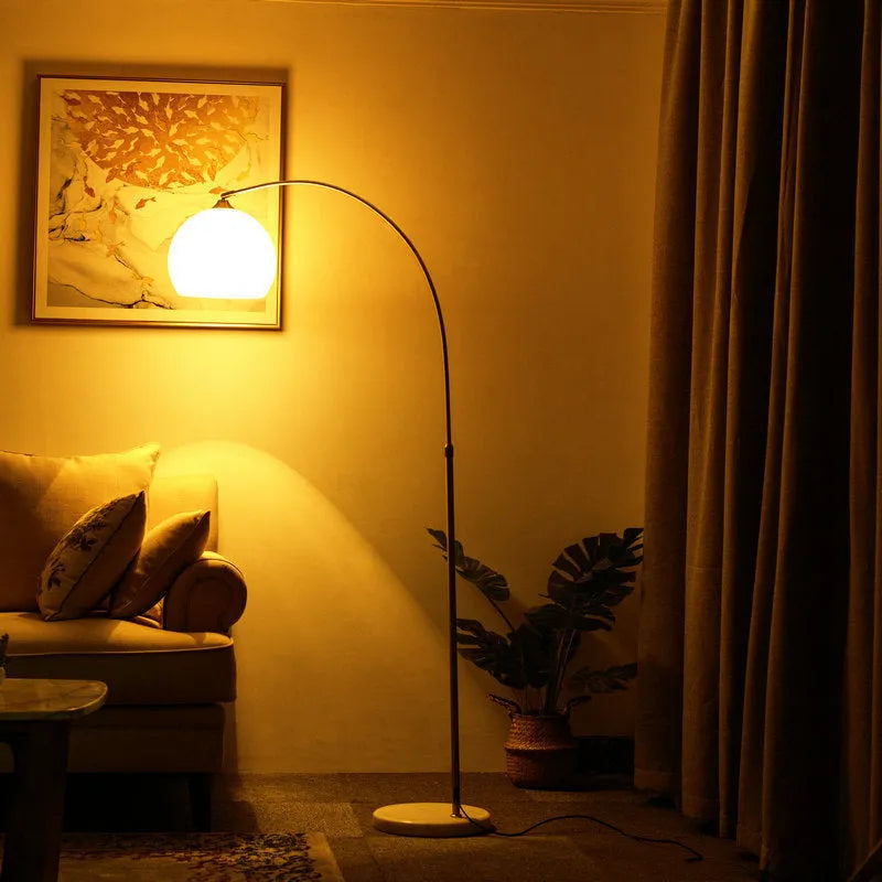 Modern minimalist fishing floor lamp with marble base, stainless steel pole, acrylic shade, 180-185cm height, white or orange shade.