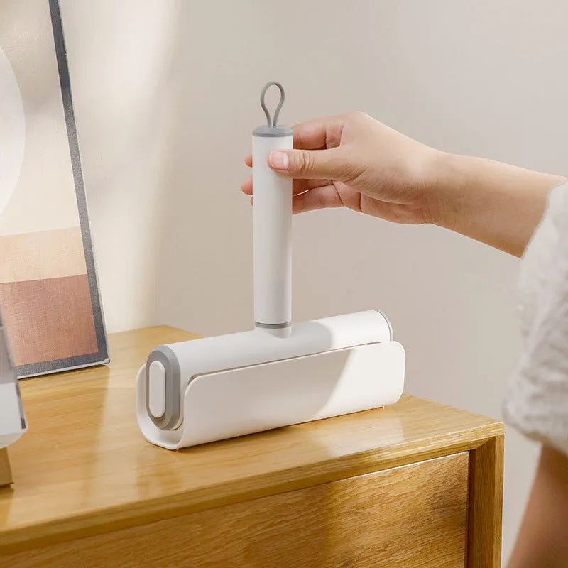 Pet hair lint remover roller with refillable sticky paper core for cat hair removal on floors
