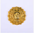 Plastic pirate gold coin toy with pointed design measuring 3.6cm diameter