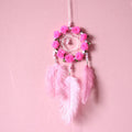 Pink ostrich feather dreamcatcher wind chime measuring 10cm for wall decoration