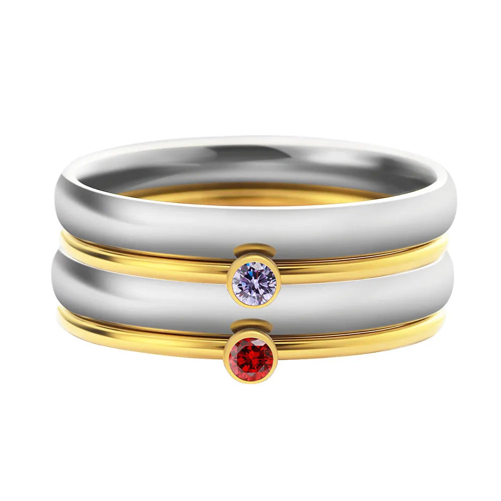 December birthstone titanium steel ring with gold electroplate and engraved geometry design.