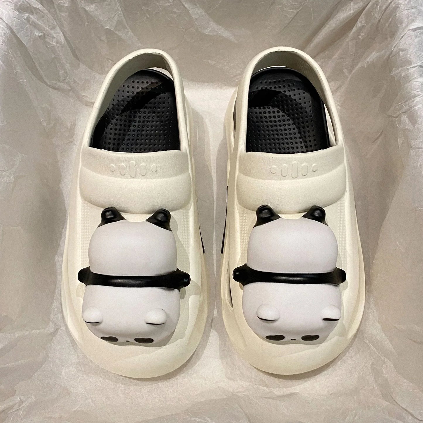 Adorable panda-themed slippers with LED lamp feature, offering cozy comfort and whimsical style for summer