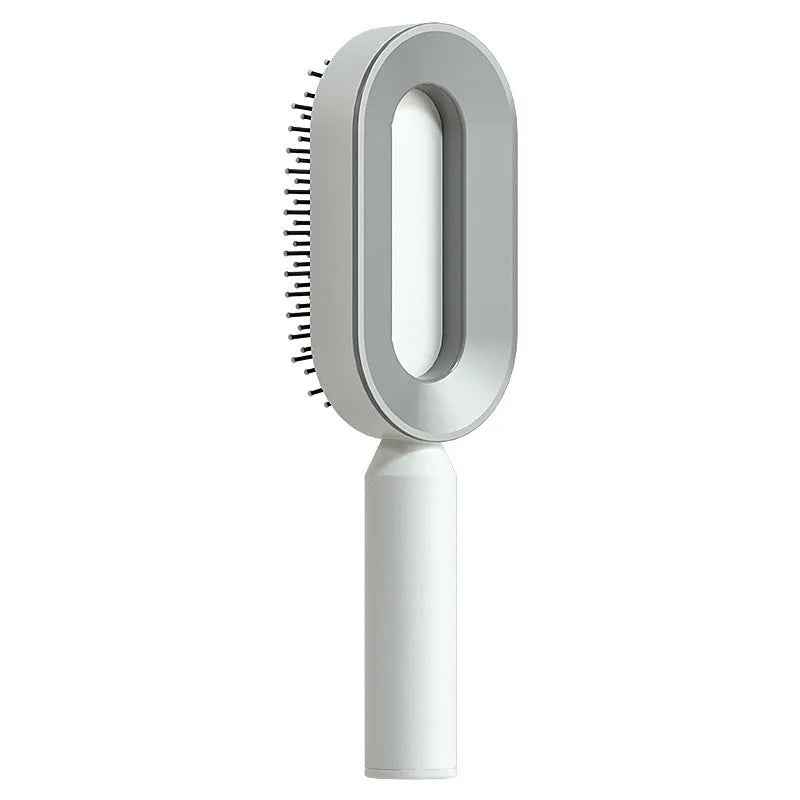 Self-cleaning hair brush with air cushion bristles in black gold, white, or purple colours