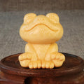 Solid bamboo smiling frog carving ornament measuring 5cm high with 120ml oil glove brush.