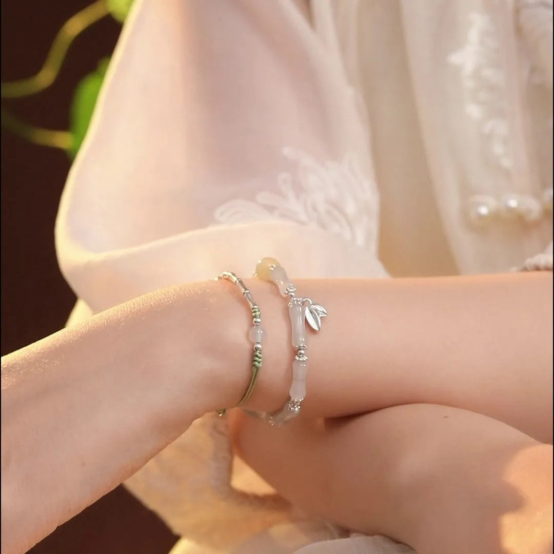 Handcrafted antique style sterling silver bracelet with Tianshan green bamboo centrepiece for women.