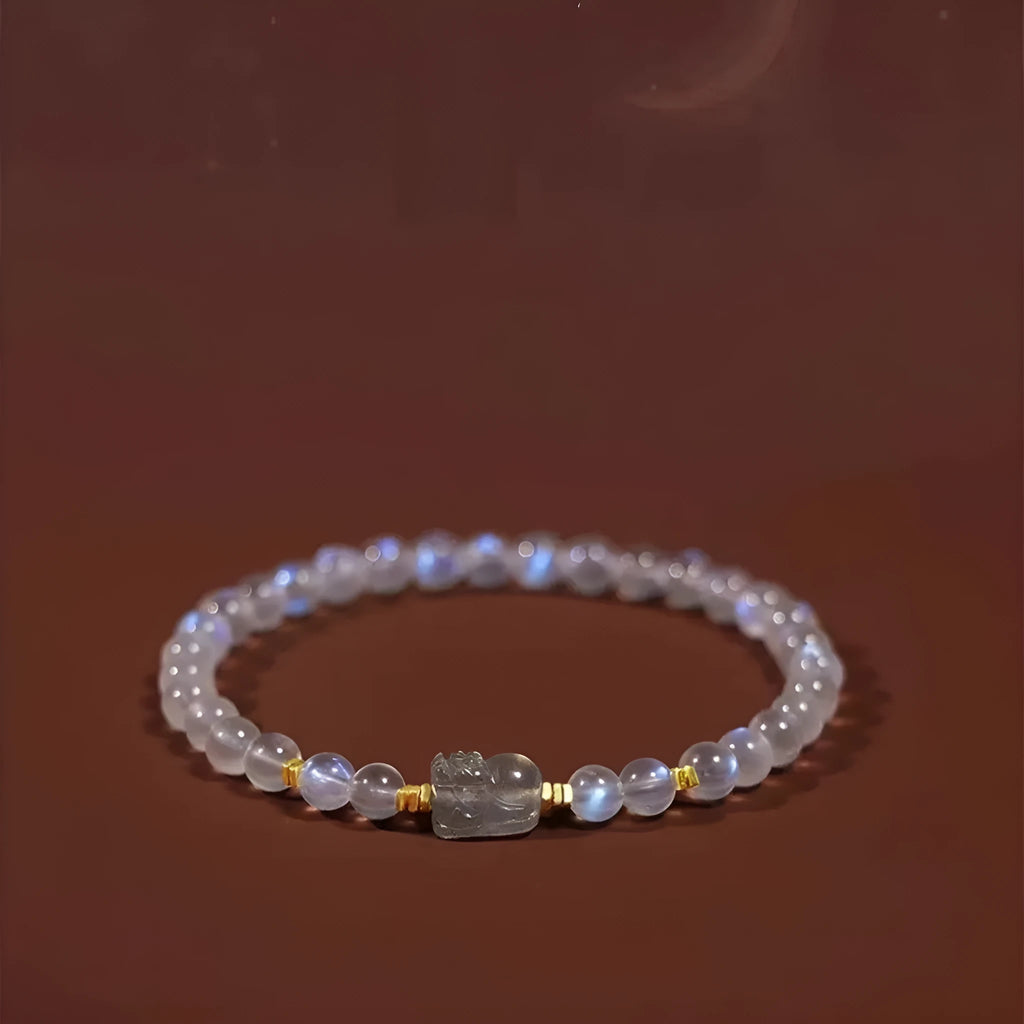 Moonstone women's bracelet with hand-ground beads and animal zodiac charms in fashion blue light colour
