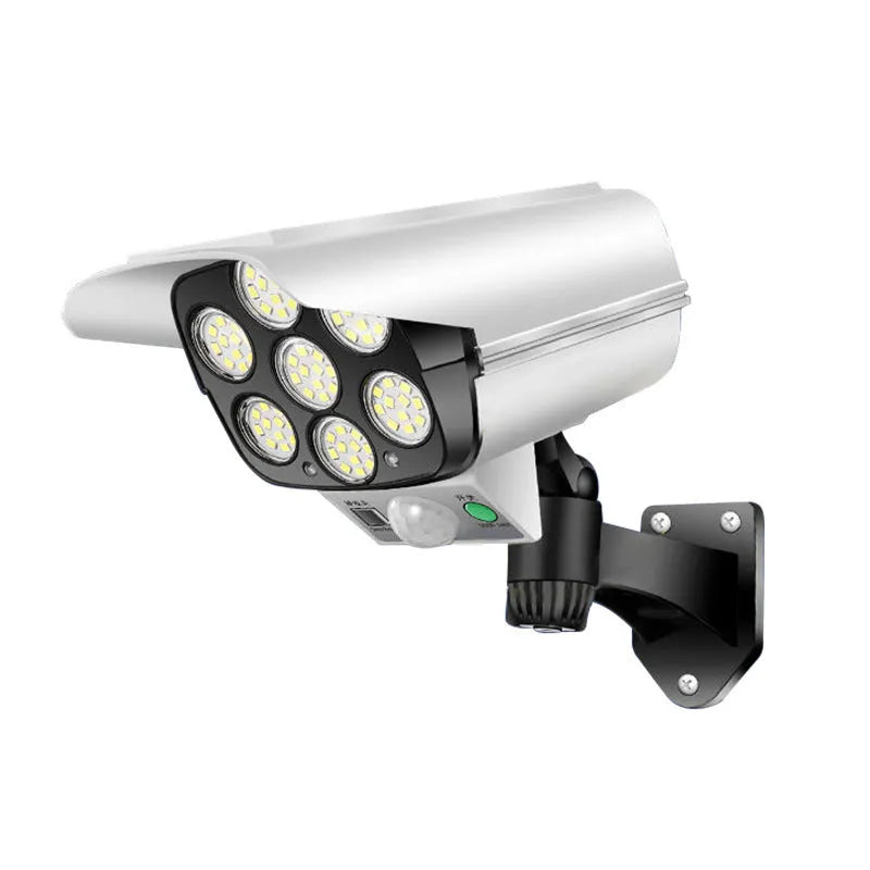 A white outdoor solar-powered security lamp with an abstraction design, mounted on a wall.