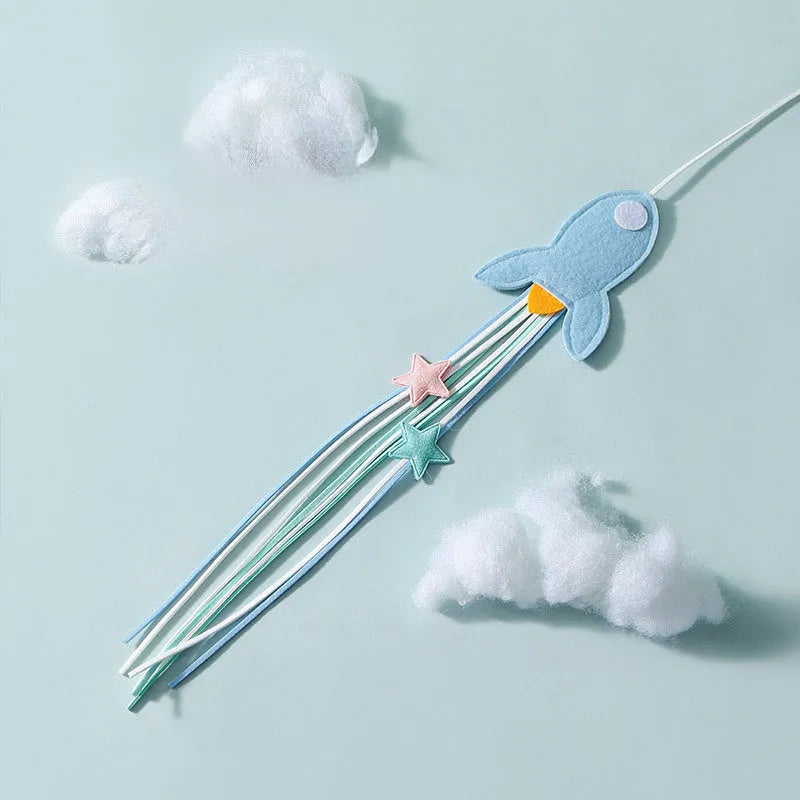 Long blue cat teaser wand with feathers and a pet rocket design on a white background.