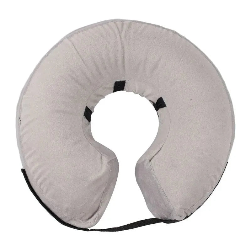 Blue inflatable dog recovery collar shown on a pet, with size chart for XS, S, M, L, XL.