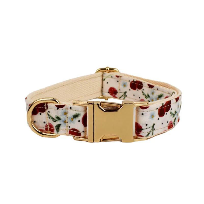Red cherry print dog collar and leash set with adjustable buckle and bow decoration