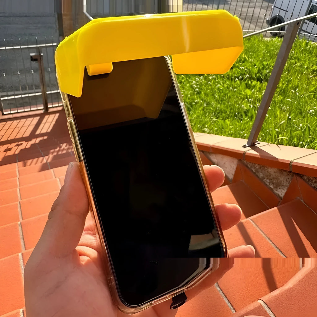 Yellow foldable plastic phone sunshade holder with phone clip for beach use.