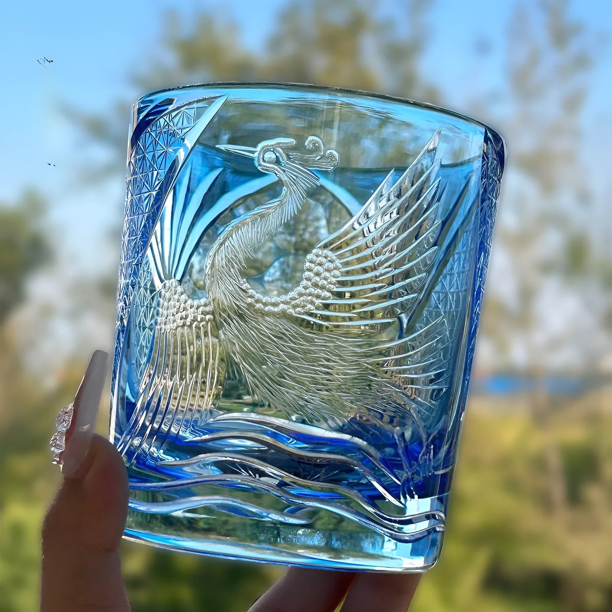 Crystal glass hand carved whiskey shot glass in crane water blue sky blue colour 90x100mm