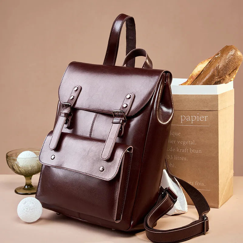 Genuine cowhide leather women's computer backpack in black, brown, or coffee colour.