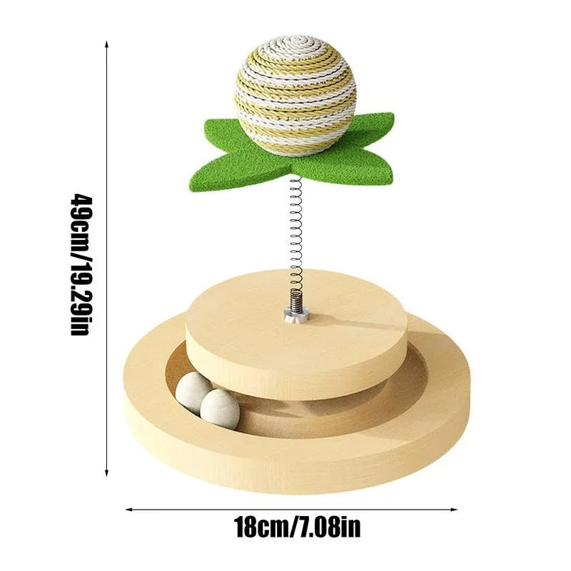 Green sisal cat toy with rotating ball track system for indoor feline play