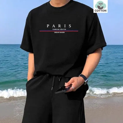 A loose-fit men's short-sleeve T-shirt with a printed letter design, shown in apricot colour.