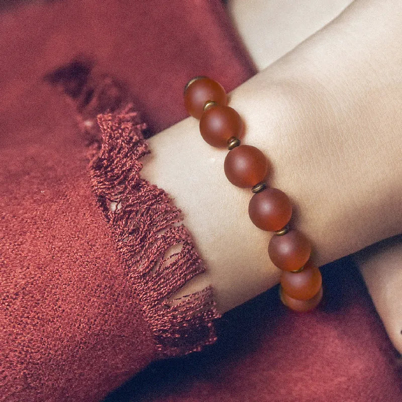 Ethnic couples bracelet with antique-finished green agate beads on natural cord.