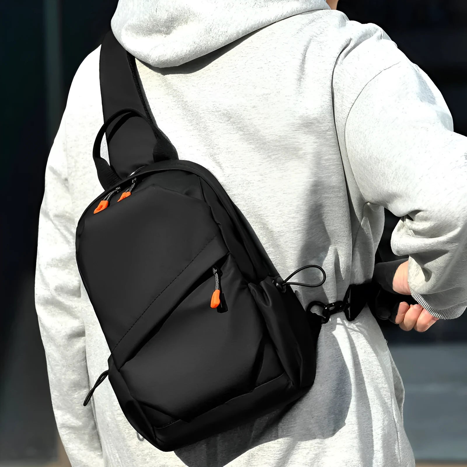Black mens waterproof polyester crossbody bag with adjustable shoulder strap